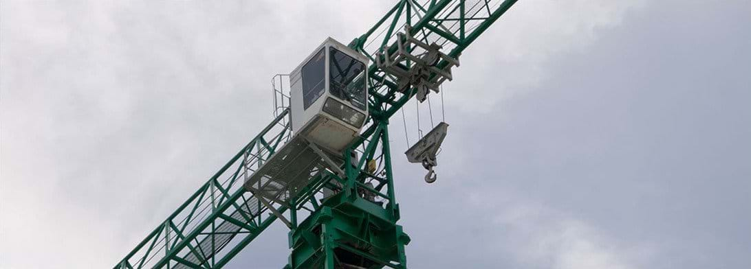 Close-up external shot of a crane operator's cockpit